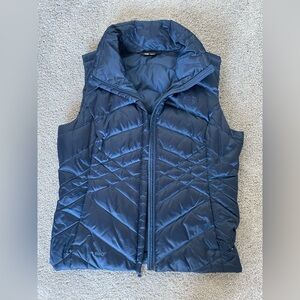 North Face women’s medium puffer vest, rich blue, excellent condition.